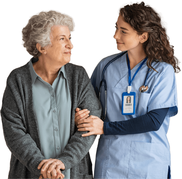 A nurse walking arm in arm with an older patient
